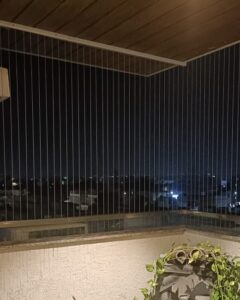 Invisible grills for apartment balconies